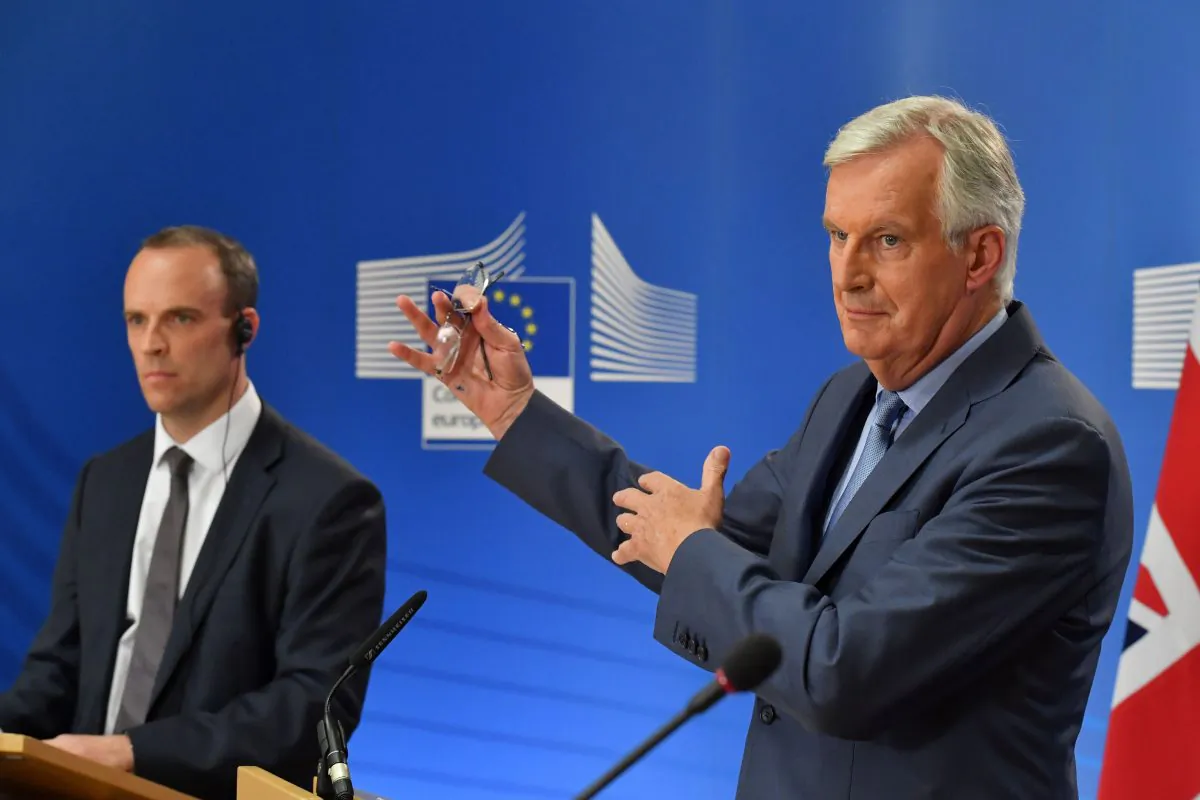 EU chief negotiator Michel Barnier (R) and Britain's Brexit secretary Dominic Raab said that Brexit negotiations would now proceed “continuously," at a joint press conference in Brussels on Aug. 21, 2018. (John Thys/AFP/Getty Images)