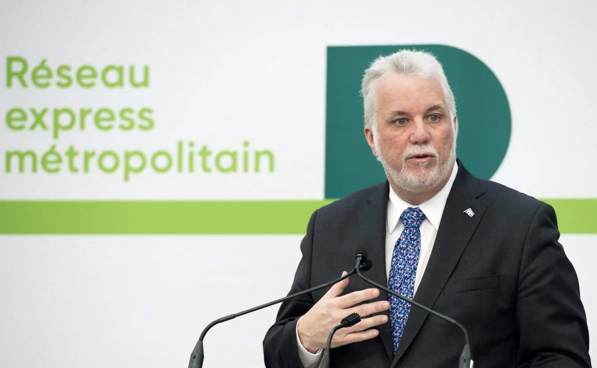 Quebec Premier Philippe Couillard speaks during a news conference in Montreal on Feb. 8, 2018 where he announced details of new automated light rail system for the Montreal region. The Canada Infrastructure Bank will provide a loan to help build it. (The Canadian Press/Graham Hughes)