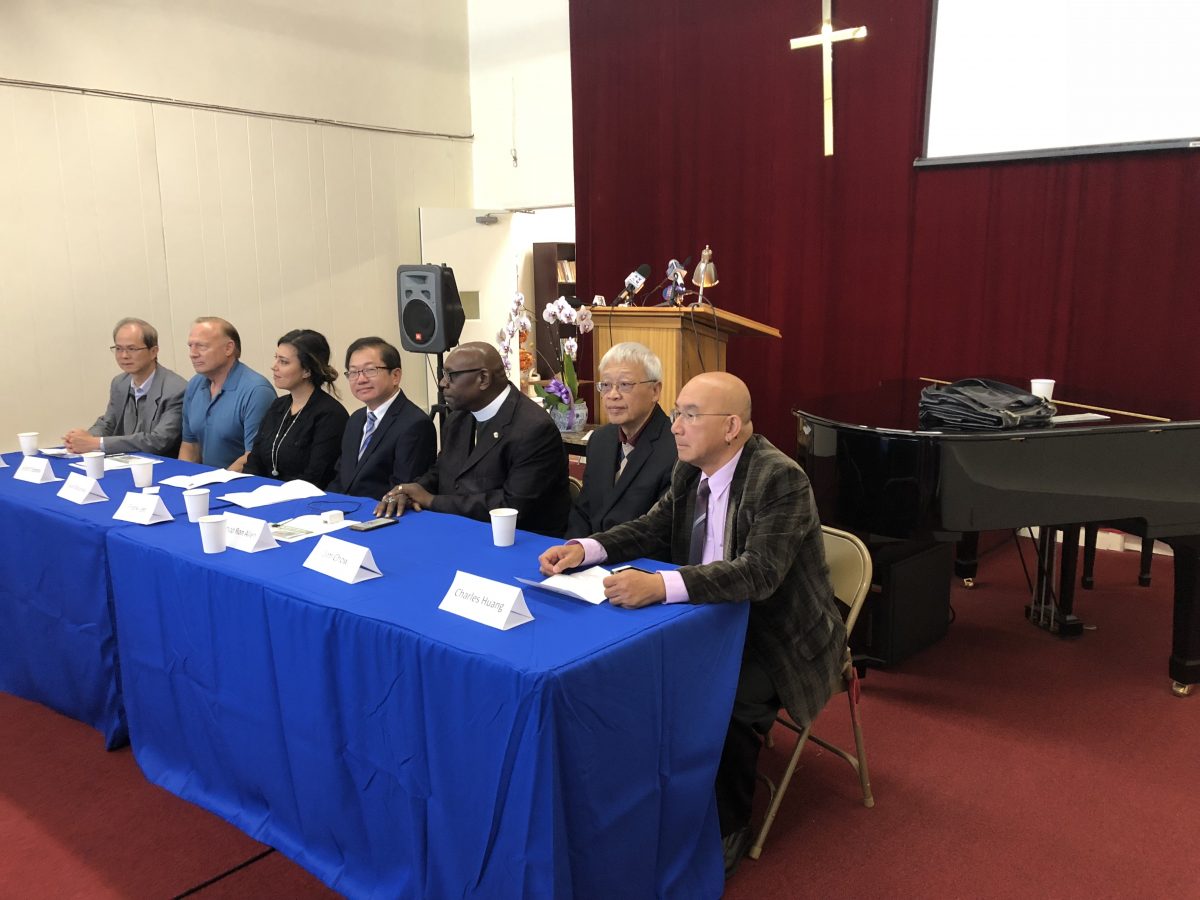 Wayne Lo, Scott Chipman, Faye Maloney, Frank Lee, Bishop Allen, Jim Chow, Charles Huang attend a press conference opposing the opening of a facility for injecting illegal drugs in San Franciso. (Nathan Su/Epoch Times)
