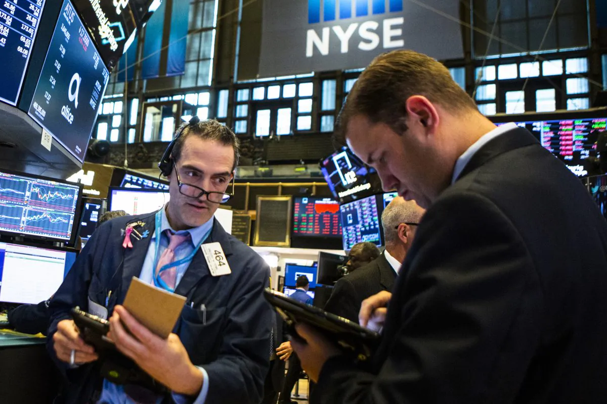 Traders work on the floor of the New York Stock Exchange ahead of the closing bell on Aug. 15, 2018. Share buybacks are now one of the biggest sources of demand for stocks. (Eduardo Munoz Alvarez/Getty Images)