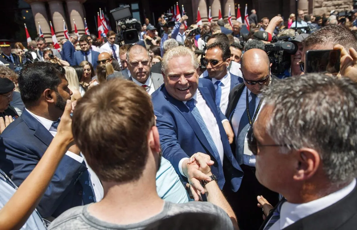 Ontario Premier Doug Ford greets people after he is sworn in as premier of Ontario during a ceremony at Queen's Park in Toronto on June 29, 2018. (The Canadian Press/Mark Blinch)