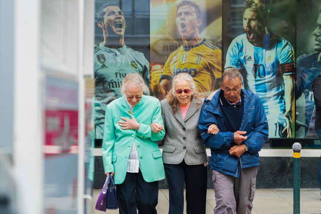 When we think of an adult caring for an elderly parent, a woman in her late 40s or early 50s comes to mind. But now, people in their 60s and 70s are caring for a parent in their 90s or older. (Philippe Leone/ Unsplash)