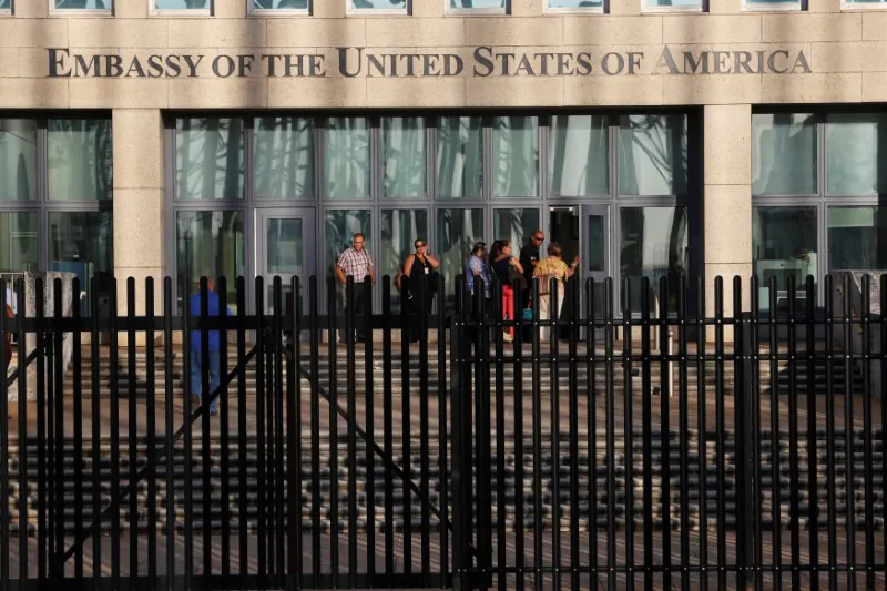 Cuban employees enter the U.S. Embassy in Havana, Cuba, August 22, 2018. (Reuters/Stringer)