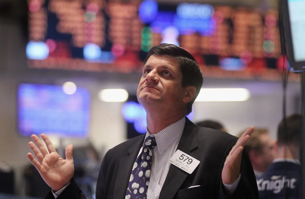 A trader works on the floor of the New York Stock Exchange in this file photo  (Mario Tama/Getty Images)