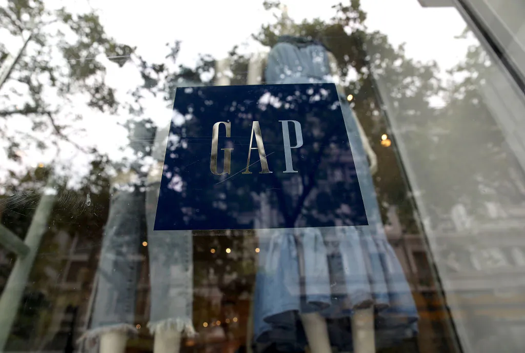 The Gap logo is displayed on a window at a Gap store in San Francisco, Calif., on May 25, 2018. (Justin Sullivan/Getty Images)