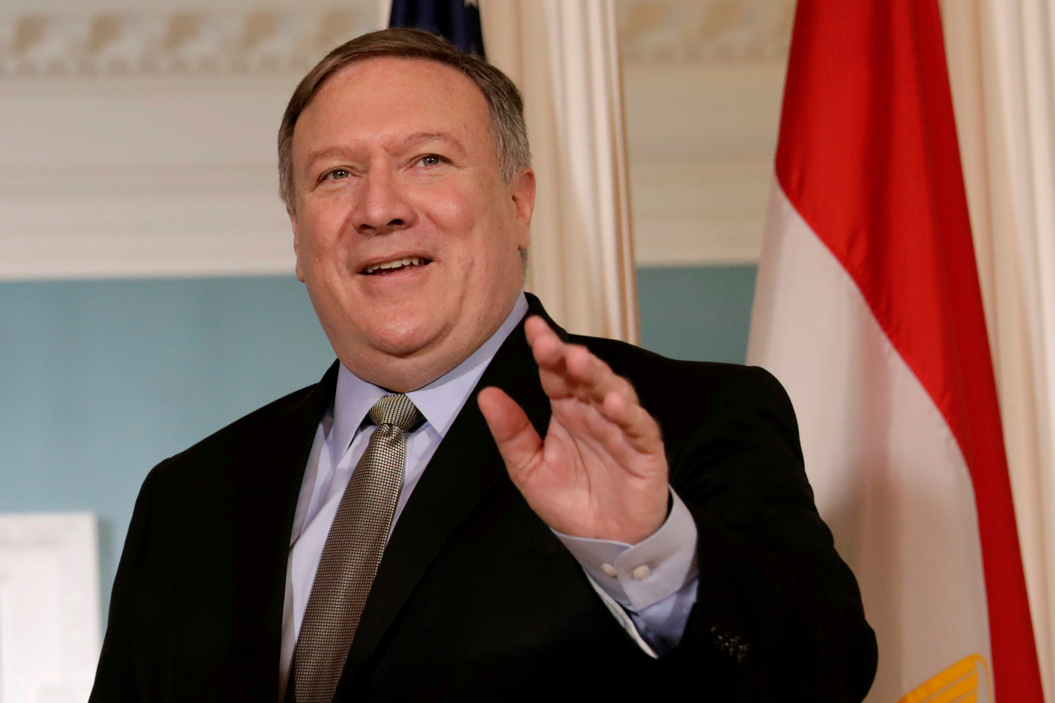 Pompeo waves to the media