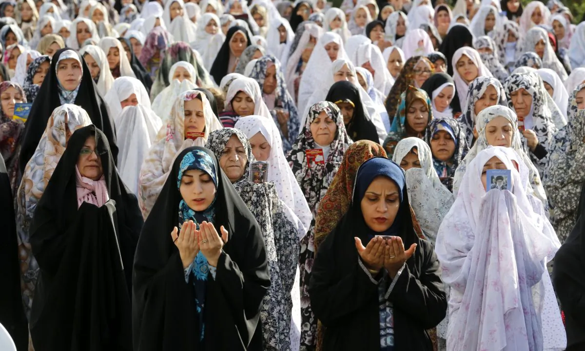 Iranian Muslims perform Eid al-Fitr prayers in western Tehran on June 15, 2018. (ATTA KENARE/AFP/Getty Images)