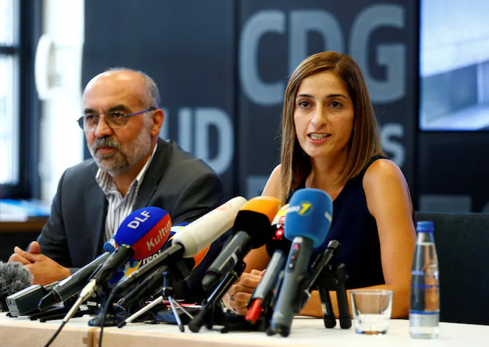 German journalist Mesale Tolu and Baki Selcuk from a supporters group address a news conference at Stuttgart airport, Germany, August 26, 2018. (Reuters/Ralph Orlowski)
