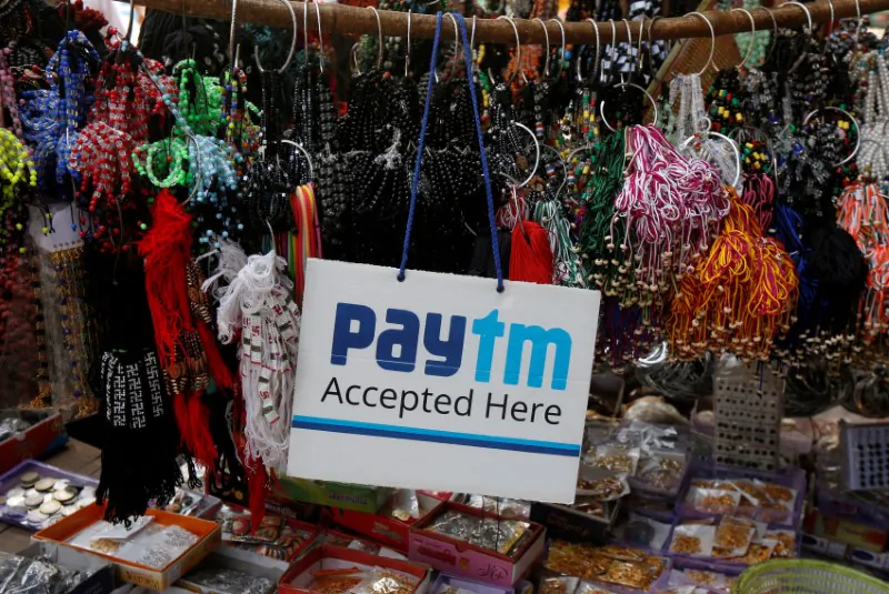 An advertisement of Paytm, a digital wallet company, is pictured at a road side stall in Kolkata, India, January 25, 2017. (Reuters/Rupak De Chowdhuri).