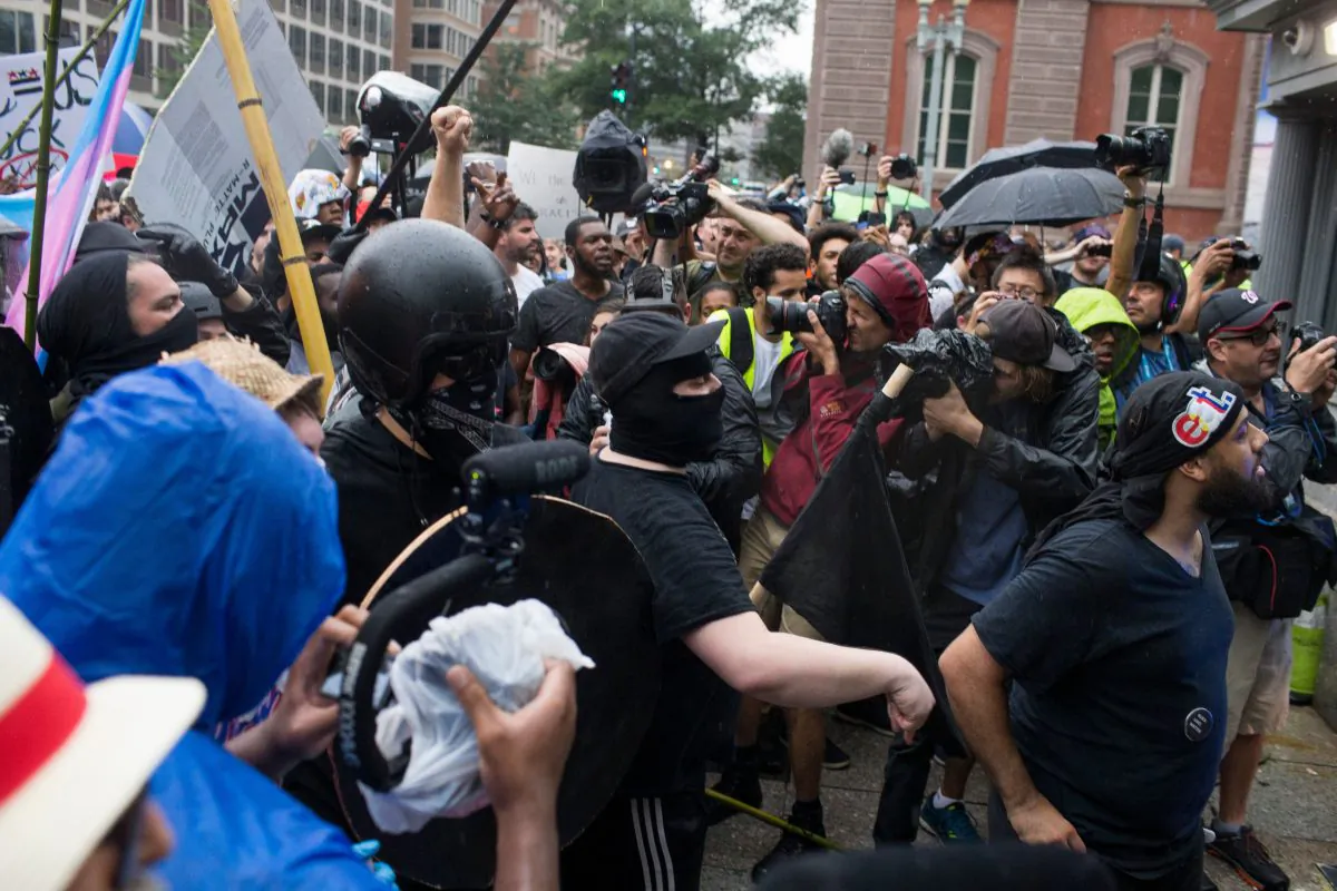 Antifa and counter-protesters to a far-right rally attempt to block the exit from Lafayette Square before Unite the Right demonstrators leave in Washington, on Aug. 12, 2018. (Zach Gibson/AFP/Getty Images)