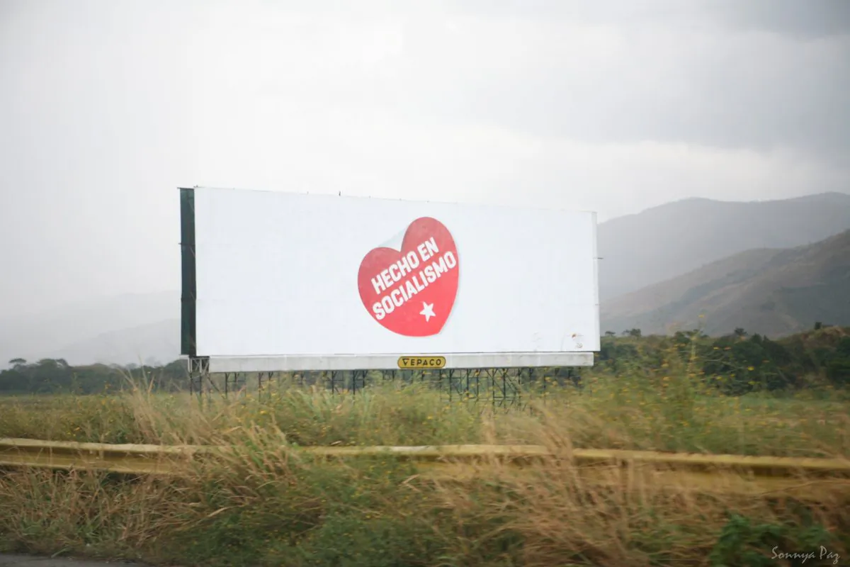 A billboard in Venezuela promotes the slogan "Made by Socialism" in this file photo. The logo also features on confiscated products by private companies. (Creative Commons)