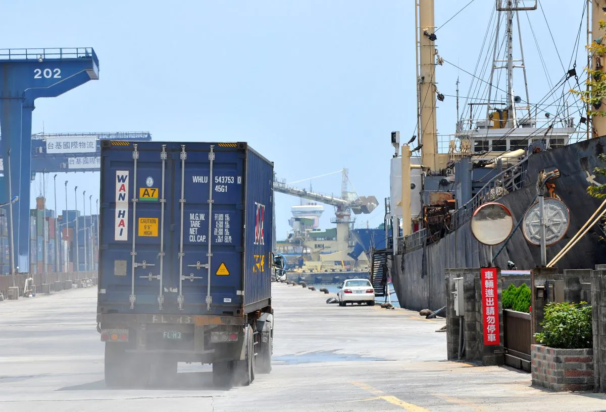 A container truck drives along a pier at Taiwan's busy northern Keelung harbor on August 8, 2011. (Patrick Lin/AFP/Getty Images)
