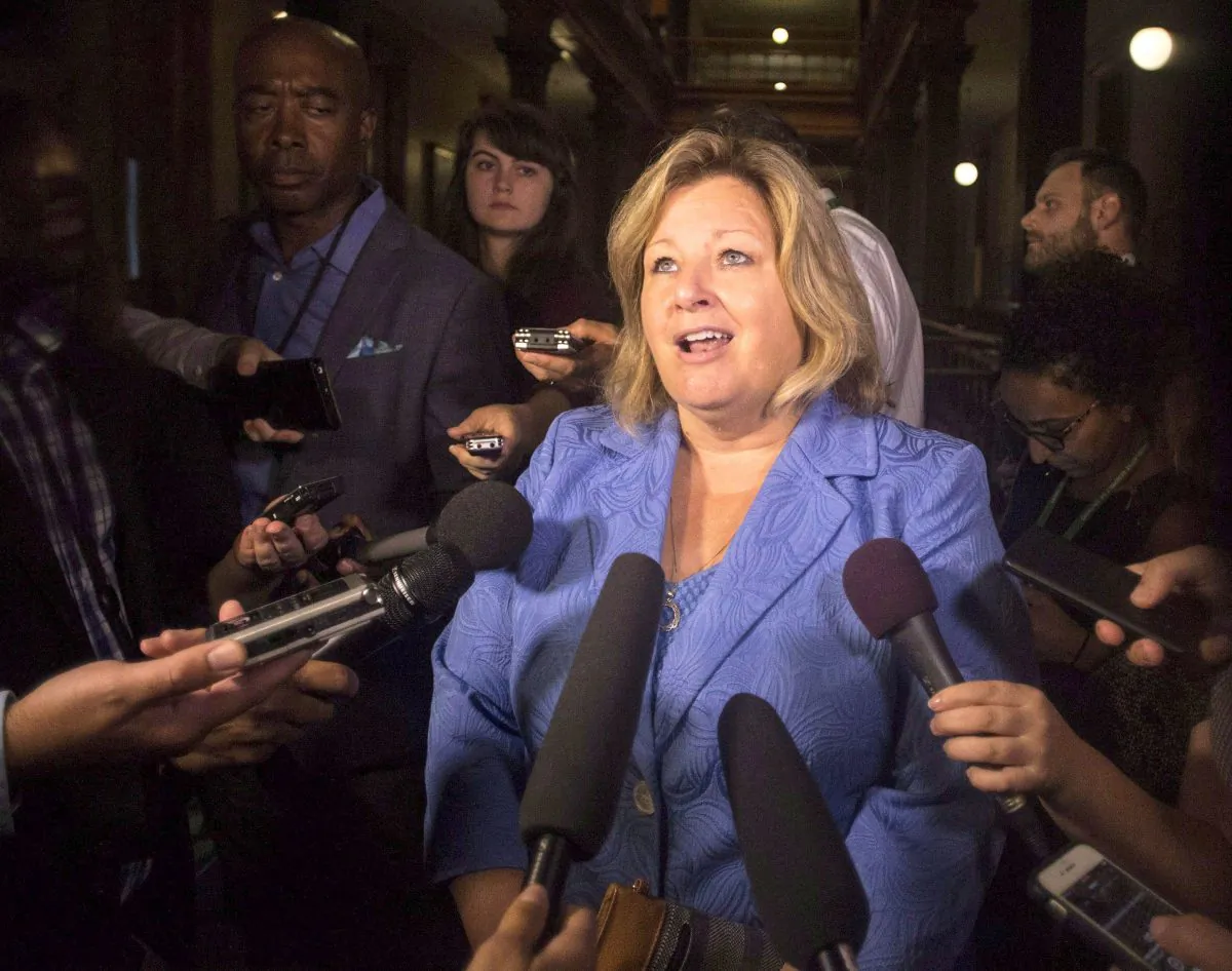 Ontario Education Minister Lisa Thompson scrums with reporters at the legislature in Toronto on Aug. 9, 2018. (THE CANADIAN PRESS/Chris Young)