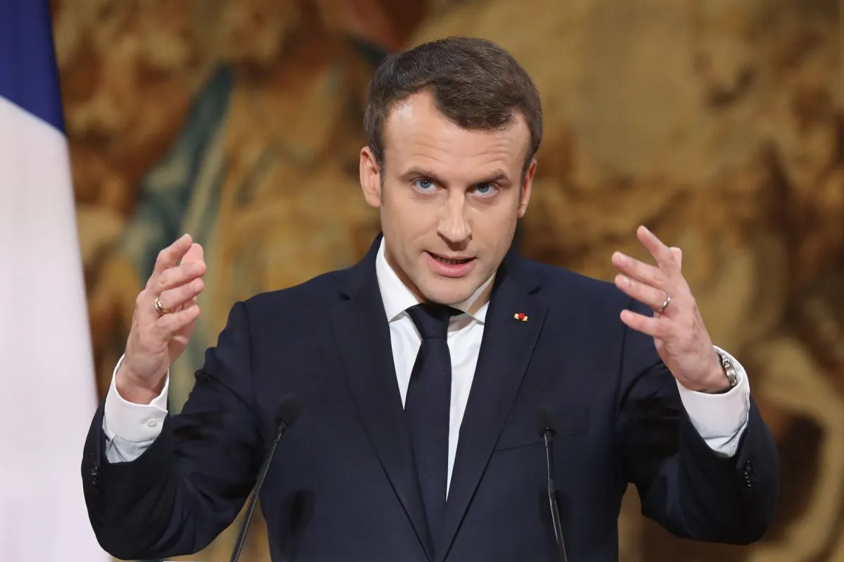 French President Emmanuel Macron delivers his New Year wishes to the press at the Elysee Palace in Paris on Jan. 3, 2018. (Ludovic Marin/AFP/Getty Images)