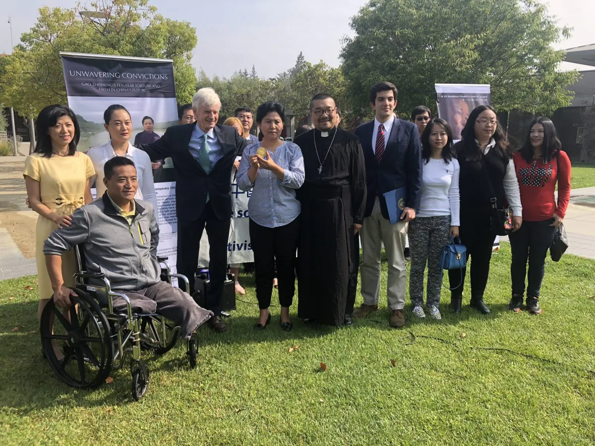 David Kilgour (4th L), Gao's wife Geng He (5th L), and Geo Saba representing Rep. Rohit Khanna (7th L) at the awarding of the Shahbaz Bhatti Freedom Award to Gao Zhisheng, in Cupertino, Calif. on Aug. 24. (Nathan Su/The Epoch Times).