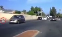 Child on Tricycle Rides Into California Rush-Hour Traffic