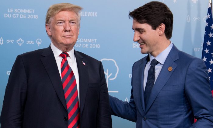 President Donald Trump and Canadian Prime Minister Justin Trudeau hold a meeting on the sidelines of the G7 Summit in La Malbaie, Quebec, Canada, on June 8, 2018. (SAUL LOEB/AFP/Getty Images)