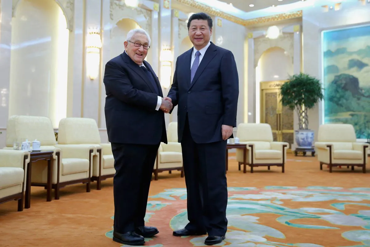 Chinese head of state Xi Jinping shakes hands with former U.S. Secretary of State Henry Kissinger at the Great Hall of the People in Beijing, China, on March 17, 2015. Since helping bring about the opening of China to the United States in 1972, Kissinger has been one of the foremost advocates for engaging China. (Feng Li/Pool/Getty Images)