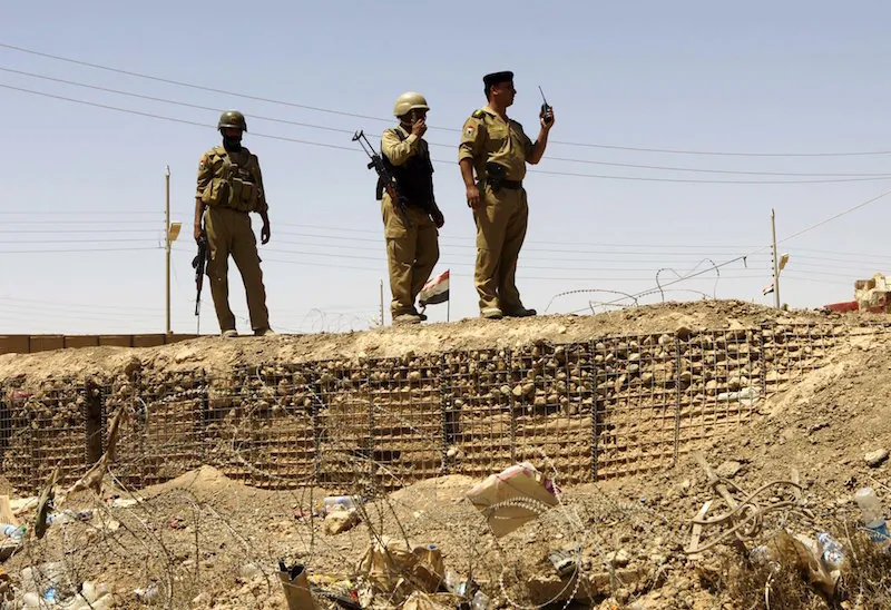 File photo: Iraqi soldiers patrol along the border between Syria and Iraq in Anbar province, Iraq on July 20, 2012. (AP/Khalid Mohammed/File)