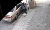 Police Video: Woman Dragged During Roadside Robbery
