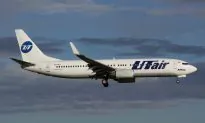Russian Passenger Plane in Flames After Running Off Runway, 18 Injured