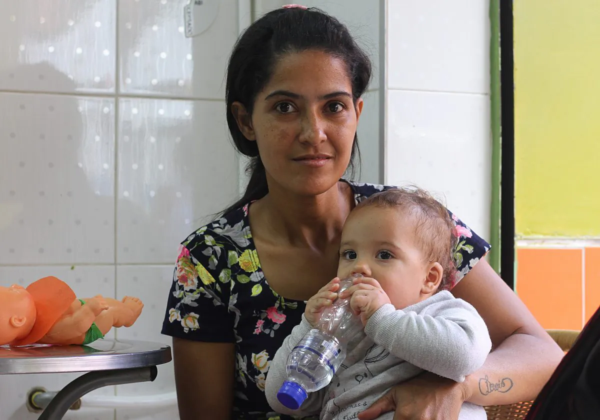 Norelia Perozo, 32, and her 1-year-old daughter Arantza, in Medellin, Colombia, on Sept. 29, 2018. Perozo fled Venezuela three months ago with her child to seek a better life in Colombia.  (Mathew Di Salvo/Special to The Epoch Times)
