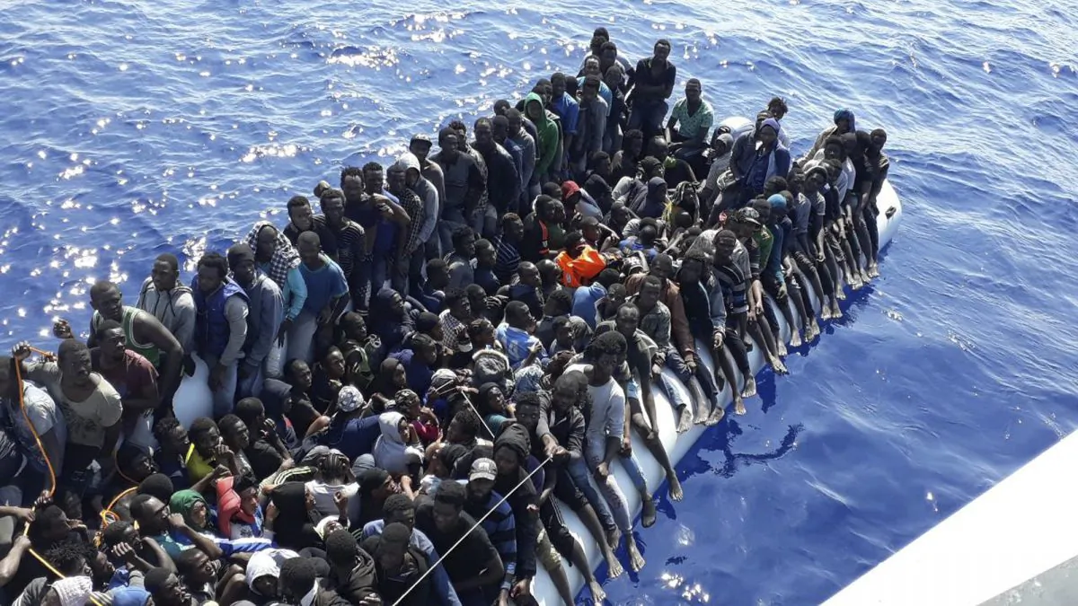 Migrants on a ship intercepted offshore on June 24, 2018, near the town of Gohneima, east of Tripoli, Libya. (Libyan Coast Guard/File Photo via AP)
