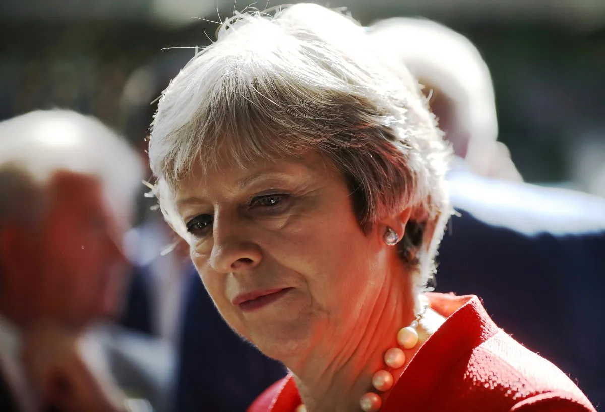 British Prime Minister Theresa May visits the Royal Welsh Show on July 26, 2018 in LLanelwedd, Wales. May announced an inquiry into the tainted blood scandal in 2017. (Christopher Furlong - WPA Pool/Getty Images)