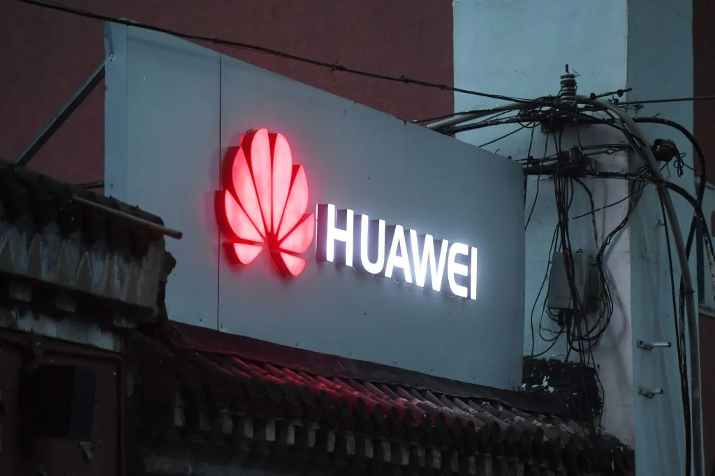 A Huawei sign outside a store selling mobile phones in Beijing on Aug. 6, 2018. (Greg Baker/AFP/Getty Images)