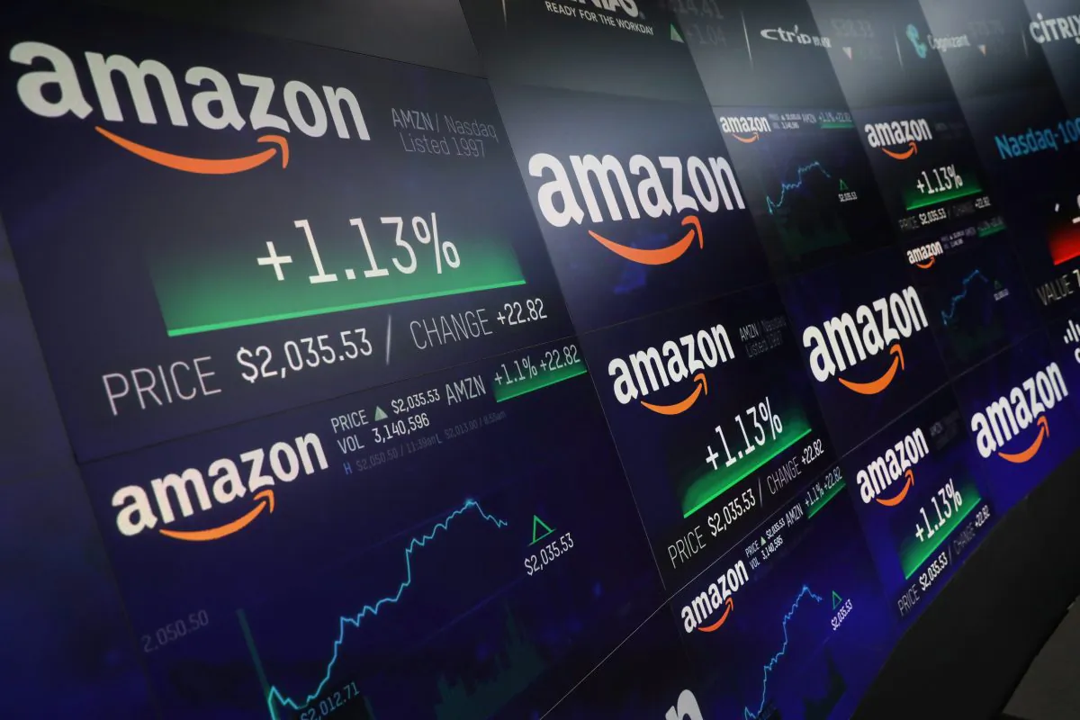The Amazon.com logo and stock price information is seen on screens at the Nasdaq Market Site in New York, on Sept. 4, 2018. (Mike Segar/Reuters)