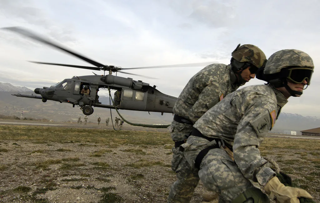 U.S. Army Soldiers from the 19th Special Forces, Utah National Guard retrieve a fast rope after being dropped into a Utah landing zone on Nov. 9, 2007, during a combat search and rescue exercise. (U.S. Air Force photo by Master Sgt. Kevin J. Gruenwald)