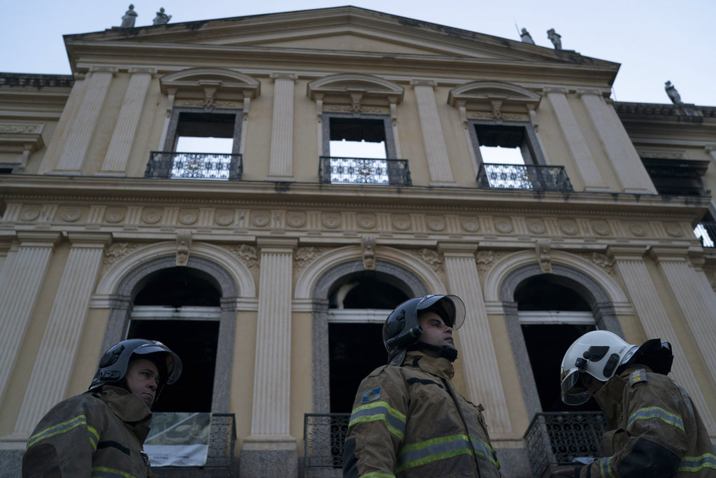 Firefighters after Brazil Rio Museum Fire