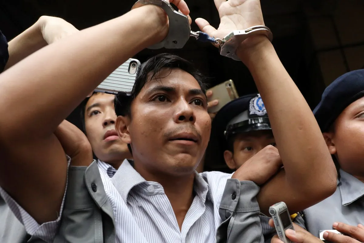 Reuters journalists Kyaw Soe Oo leaves after listening to the verdict at Insein court in Yangon, Burma on Sept. 3, 2018. (Ann Wang/Reuters)