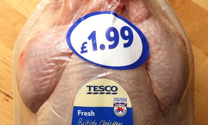 A cheap chicken purchased from a Tesco supermarket is displayed in London in this file photo. (Peter Macdiarmid/Getty Images)
