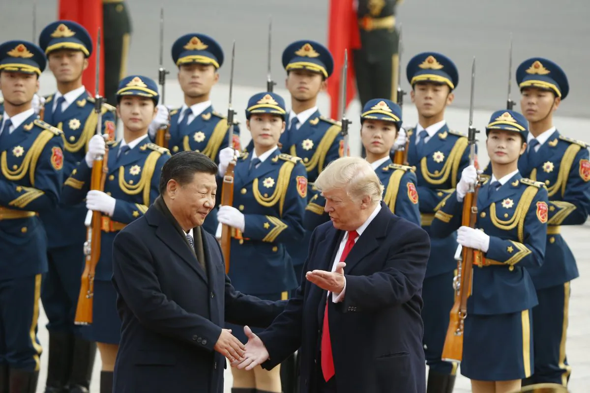 Chinese leader Xi Jinping greets U.S. President Donald Trump at a welcoming ceremony November 9, 2017 in Beijing, China. (Thomas Peter-Pool/Getty Images)