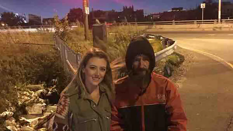 Kate McClure and John Bobbitt stand near the spot by I-95 where they say he helped her when she ran out of gas in a story later exposed as fabricated in court. (GoFundMe)
