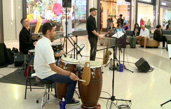 Christian Moraga is in charge of percussion and plays congas in LAX on Sept. 4 & 5. (Nina Liu/NTD)