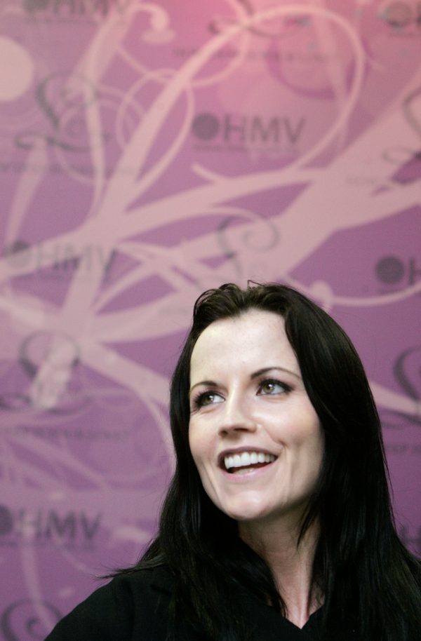 Irish singer Dolores O'Riordan poses during an autograph session to promote her new solo album