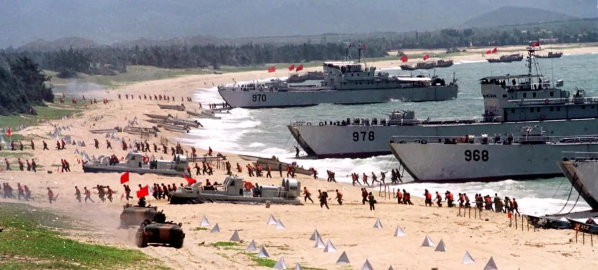 People's Liberation Army (PLA) storm ashore from landing crafts in an exercise on the mainland coast close to Taiwan on Sept. 10, 1999.  (STR/AFP/Getty Images)