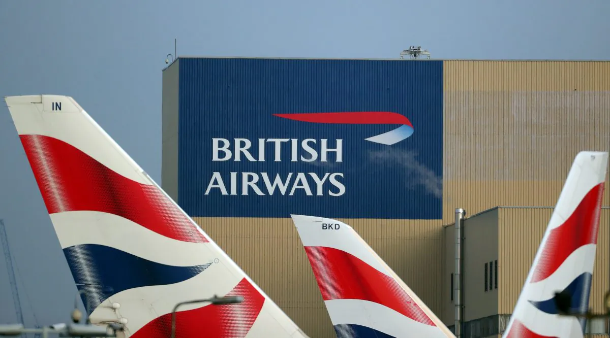 British Airways logos are seen on tail fins at Heathrow Airport in west London, Britain, on Feb. 23, 2018. (Hannah McKay/Reuters)