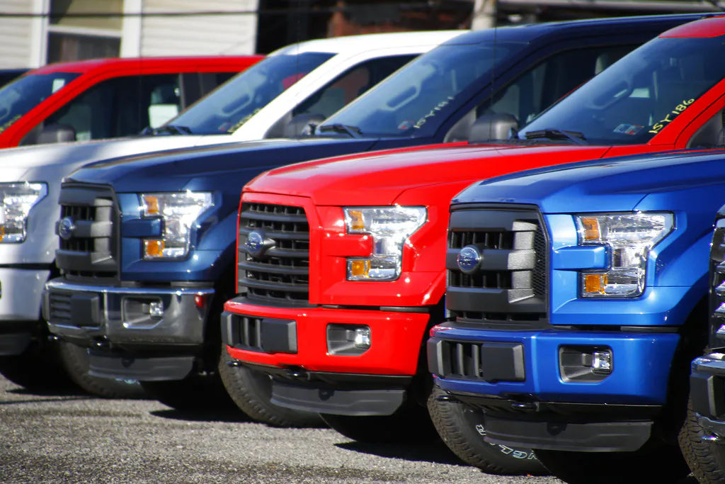 Under pressure from U.S. safety regulators, Ford is recalling about 2 million F-150 pickups in North America because the seat belts can cause fires. The recall covers certain trucks from the 2015 through 2018 model years. (Keith Srakocic/AP)