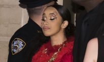 Cardi B Escorted out of Fashion Party After Lunging at Minaj