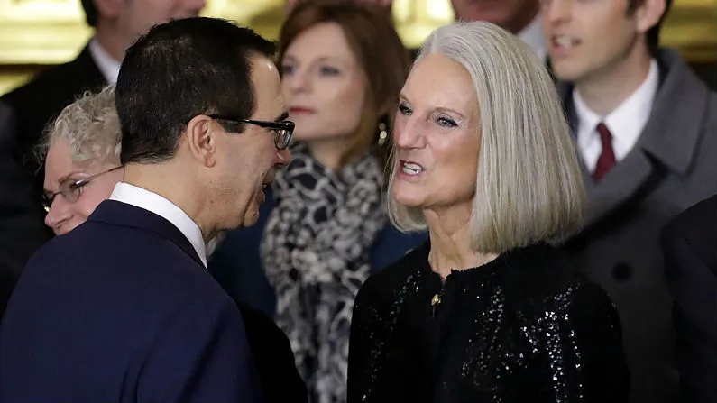 Anne Graham Lotz (R) talks to Treasury Secretary Stephen Mnuchin (L) following a ceremony to honor Rev. Billy Graham as his body lies in honor in the U.S. Capitol Rotunda Feb. 28, 2018 in Washington, DC. (Chip Somodevilla/Getty Images)