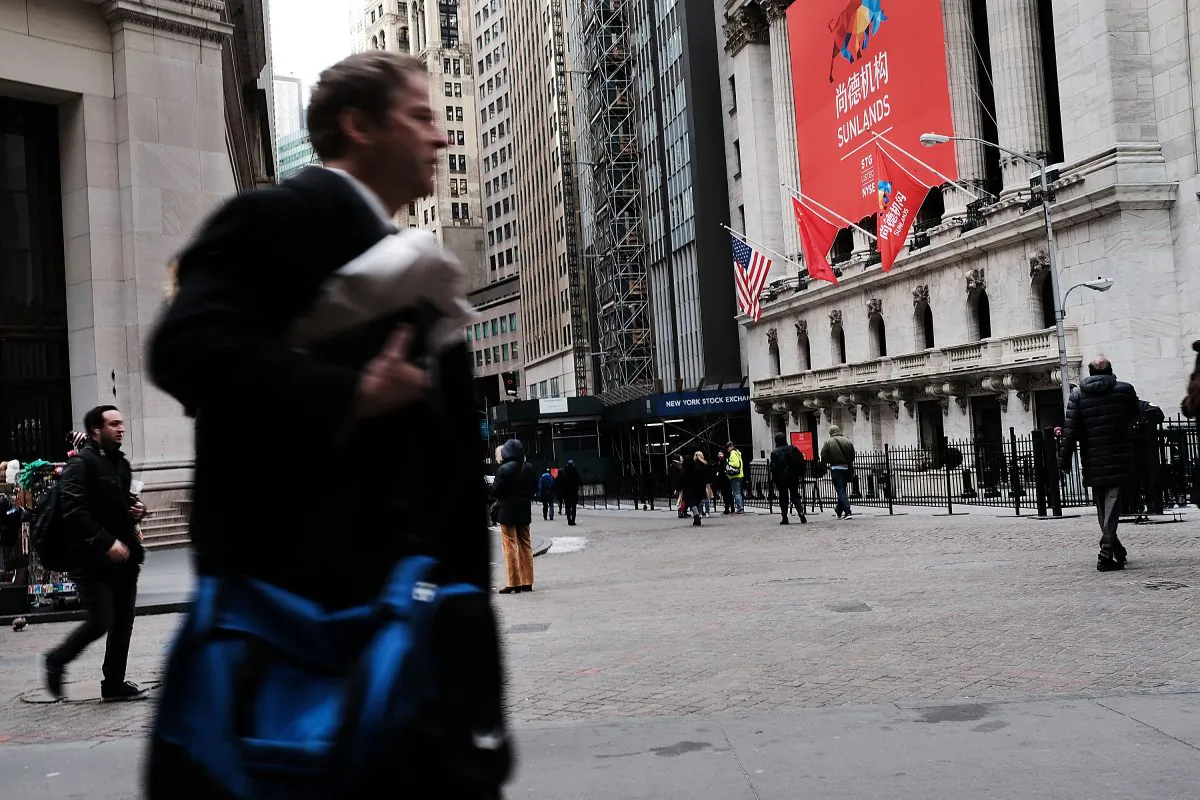 The New York Stock Exchange, with a Chinese national flag hanging in front, on the day of a Chinese company's U.S. IPO, on March 23, 2018. (Spencer Platt/Getty Images)