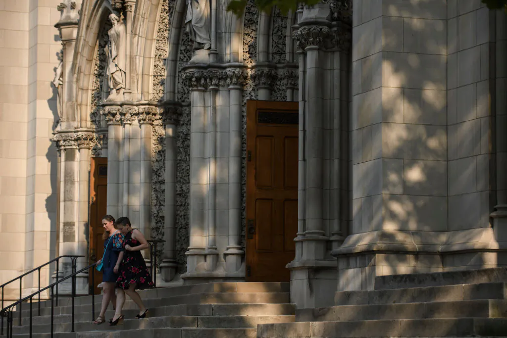 Parishioners leave St Paul Cathedral, the mother church of the Pittsburgh Diocese in Pittsburgh, Pennsylvania, on on Aug. 15, 2018. (Jeff Swensen/Getty Images)