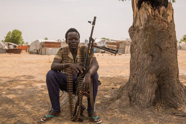 A government soldier poses with a gun on March 7, 2017, in Leer, South Sudan. (Stefanie Glinski/AFP/Getty Images)