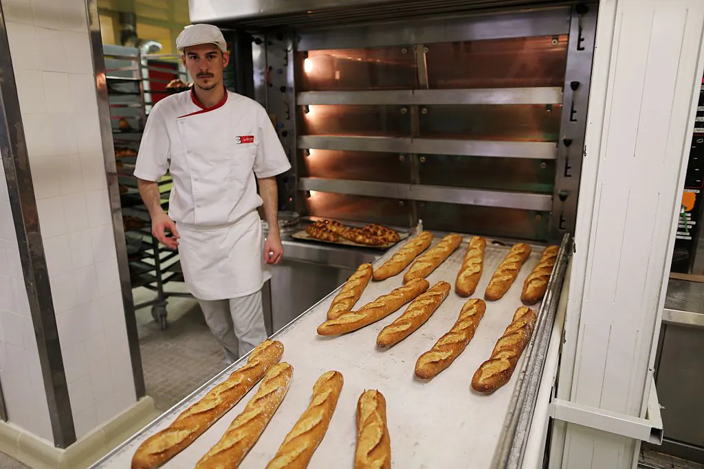 Baking baguettes at the Institut National de la Boulangerie Patisserie, the French national baking and pastry-making institute. (Charly Triballeau/Getty Images)