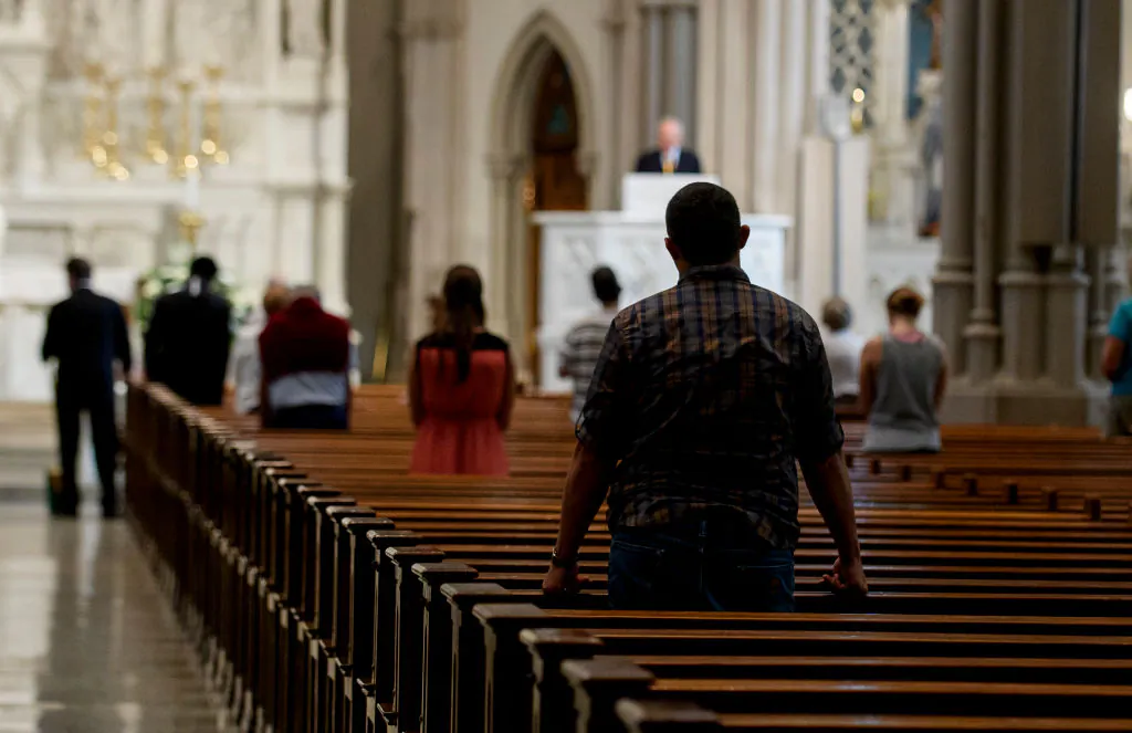 Parishioners worship during a mass to celebrate the Assumption of the Blessed Virgin Mary at St Paul Cathedral, the mother church of the Pittsburgh Diocese in Pittsburgh, Pennsylvania, on Aug. 15, 2018. (Jeff Swensen/Getty Images)