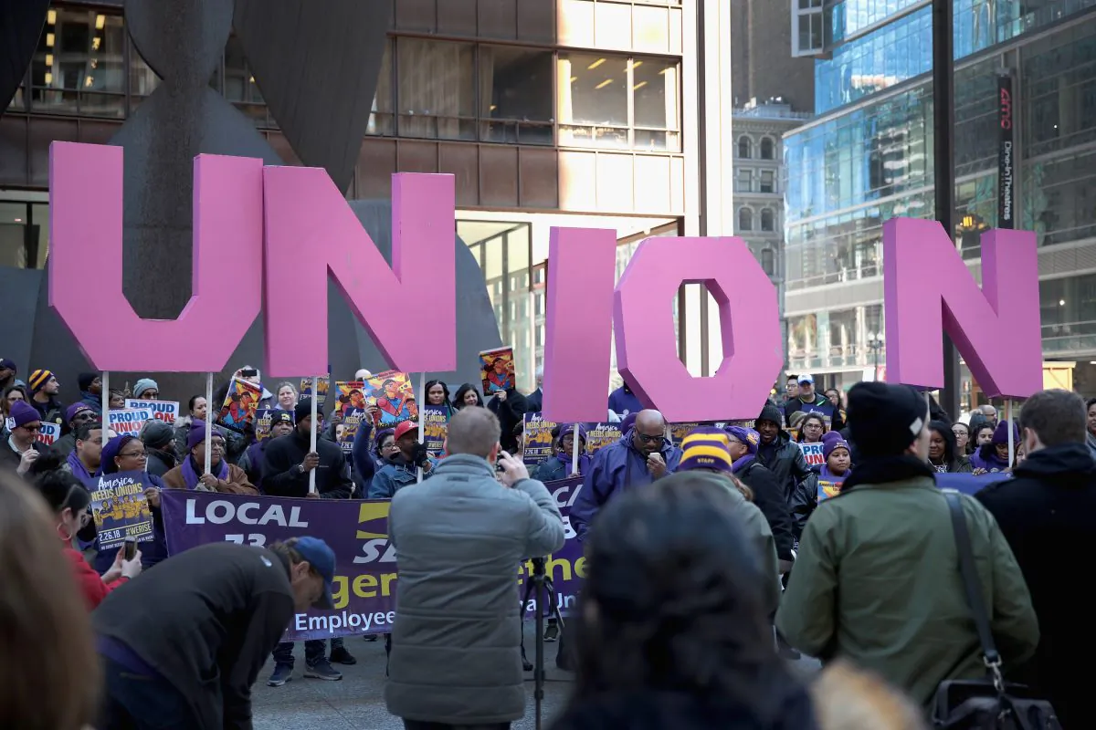 Members of the Service Employees International Union (SEIU) hold a rally at the Richard J. Daley Center plaza in Chicago, Ill., on Feb. 26, 2018. (Scott Olson/Getty Images)