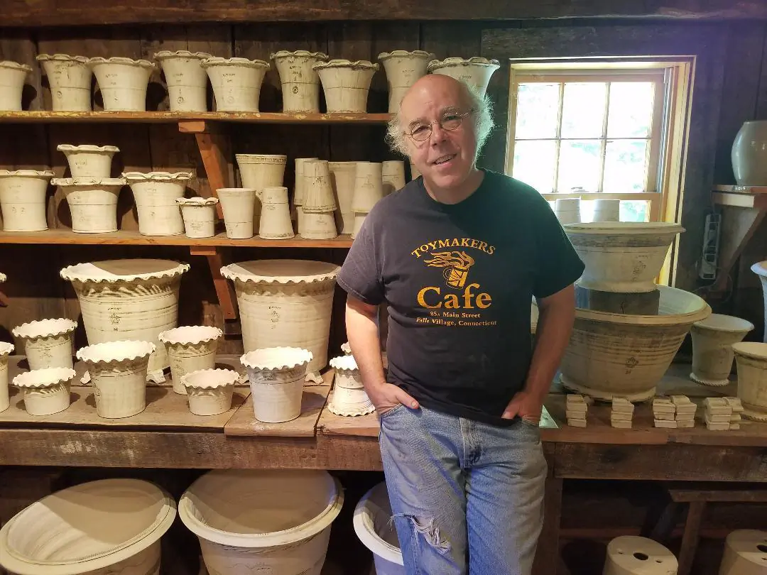 Guy Wolff with his pottery in his Litchfield County home. (Ryan Stewart)